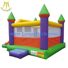 China Hansel stock largest inflatable bouncer castle with slide in amusement park in China supplier