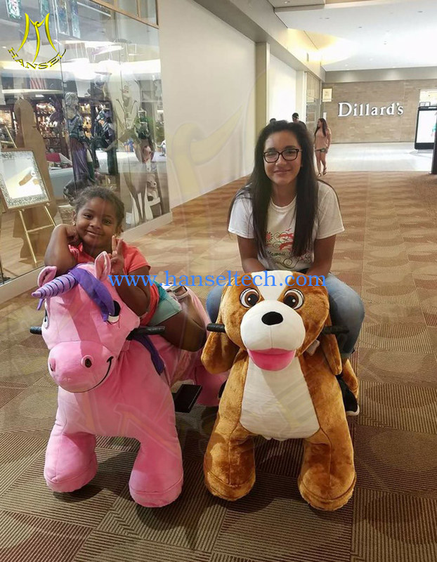 girls riding stuffed animals