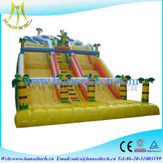 China Hansel attractive kids amusement park games inflatable climbing wall with slide supplier