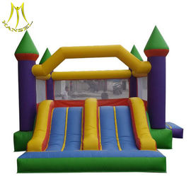 Hansel stock largest inflatable bouncer castle with slide in amusement park in China supplier